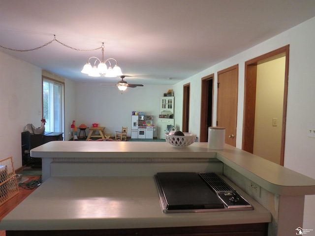 kitchen with a center island and wood-type flooring