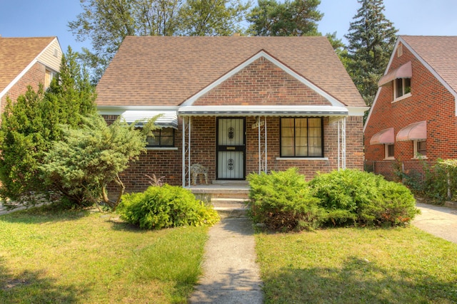 bungalow with a front yard