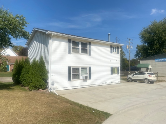 view of property exterior with cooling unit