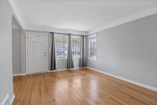 entrance foyer with light hardwood / wood-style floors