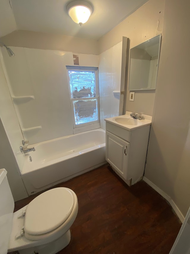 full bathroom featuring vanity, shower / bathing tub combination, wood-type flooring, and toilet