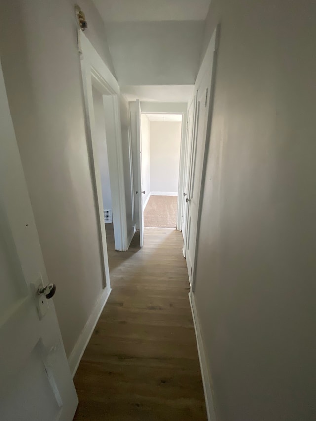 hall featuring dark hardwood / wood-style floors