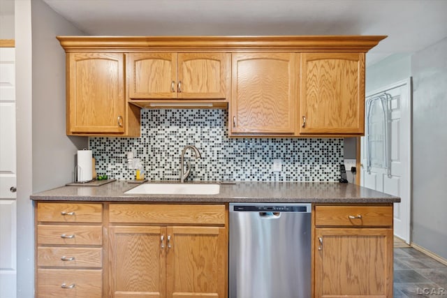 kitchen with dishwasher, sink, and tasteful backsplash