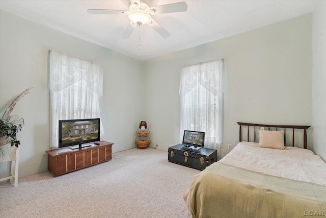 bedroom with carpet floors and ceiling fan