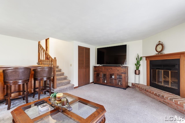 carpeted living room featuring a fireplace and bar