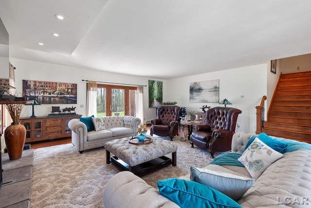 living room with french doors and wood-type flooring