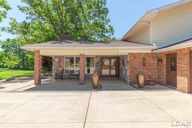 view of patio featuring french doors