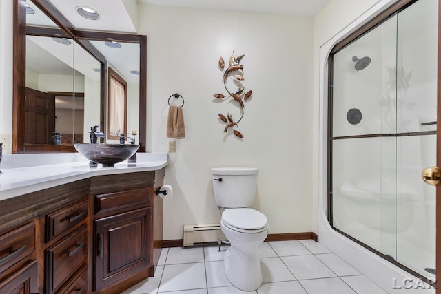 bathroom with vanity, a baseboard heating unit, tile patterned flooring, toilet, and an enclosed shower