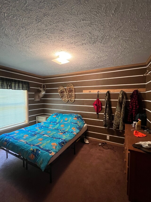 9996 N Chippewa Rd, Coleman, MI 48618 - carpeted bedroom featuring a textured ceiling