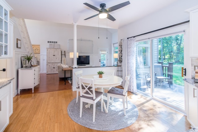 dining room featuring light hardwood / wood-style floors and ceiling fan