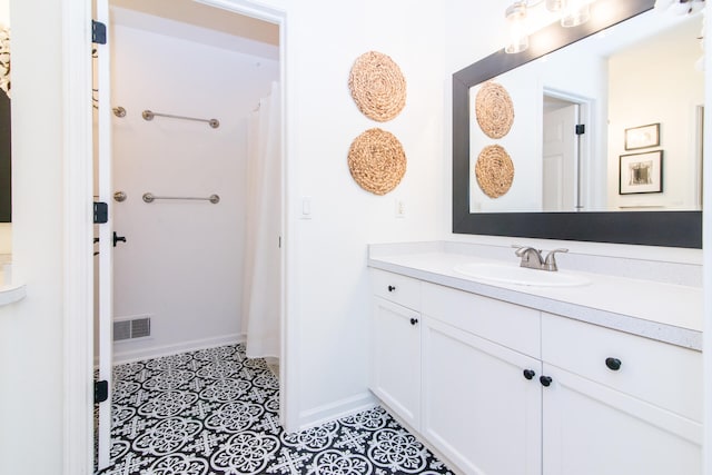 bathroom featuring vanity and tile patterned floors