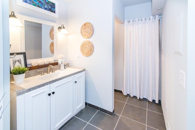 bathroom featuring tile patterned floors and vanity