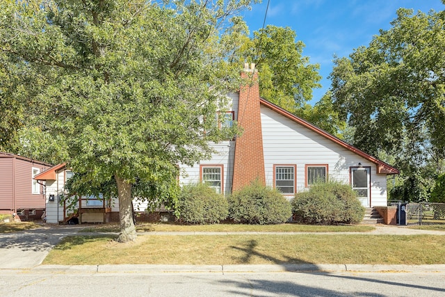 view of front of home with a front yard