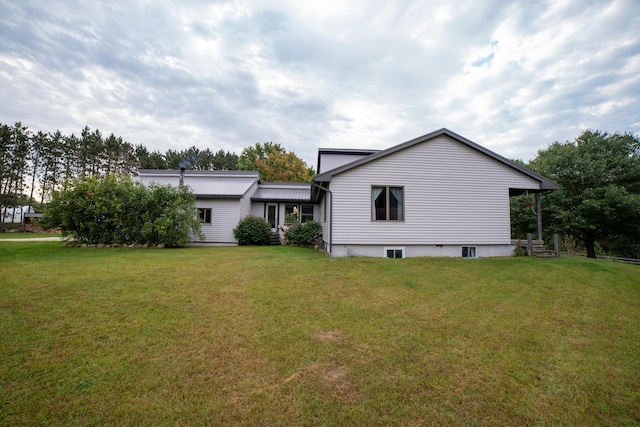 21493 20 Mile Rd, Tustin, MI 49688 - back of property with a lawn