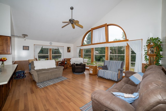21493 20 Mile Rd, Tustin, MI 49688 - living room with high vaulted ceiling, ceiling fan, and light wood-type flooring