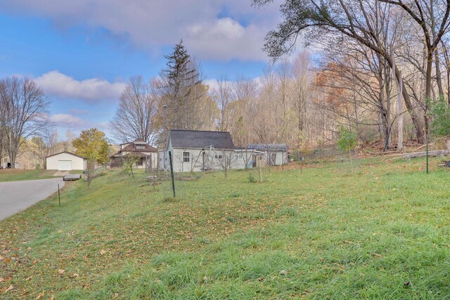 view of yard with a garage