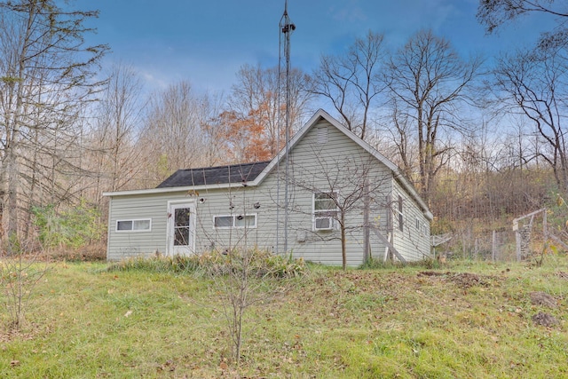 view of front of property with solar panels