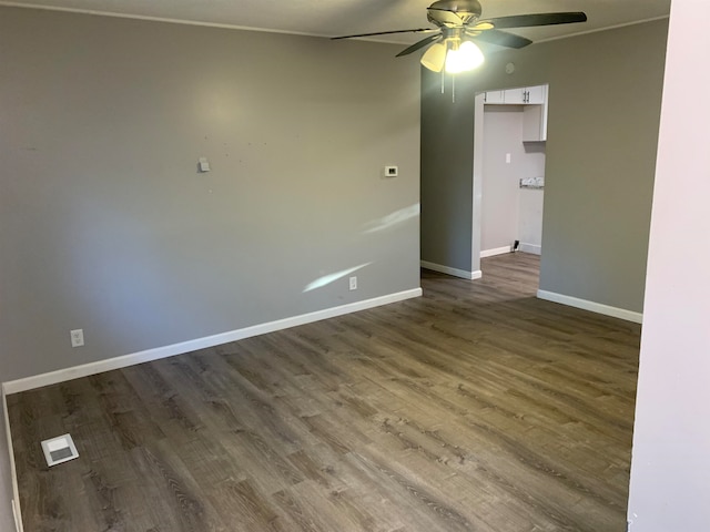 spare room with ceiling fan and hardwood / wood-style floors