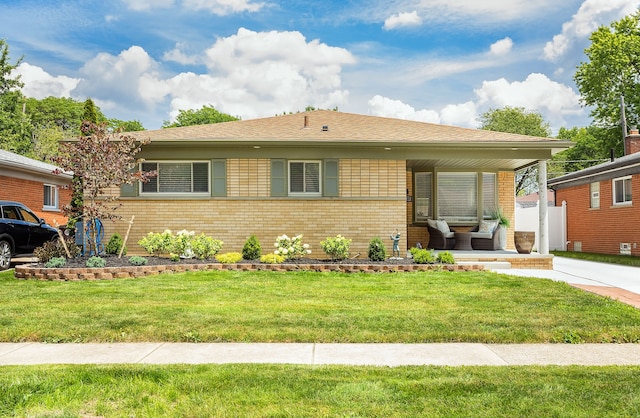 ranch-style house featuring a front yard and a porch