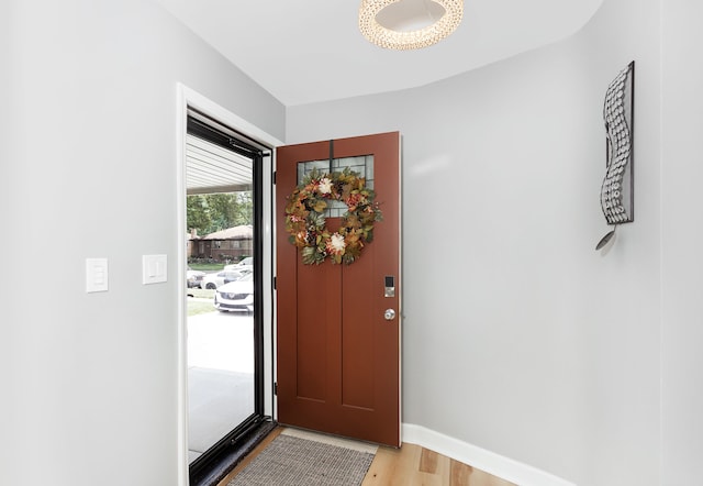 doorway to outside featuring light wood-type flooring