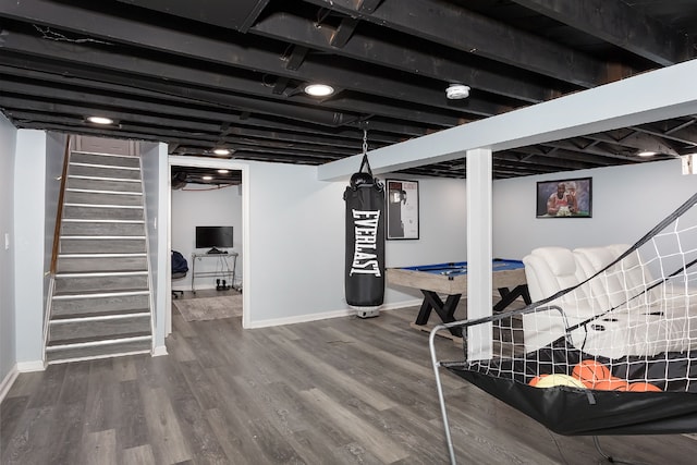 basement featuring wood-type flooring