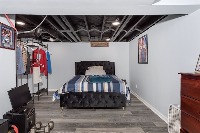 bedroom with wood-type flooring