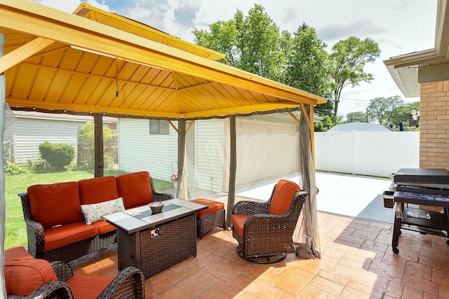 view of patio / terrace featuring outdoor lounge area and a grill