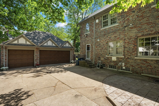 exterior space with a garage