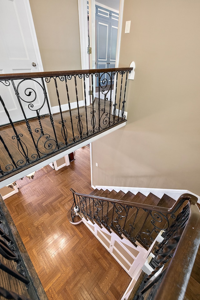 stairs with parquet flooring