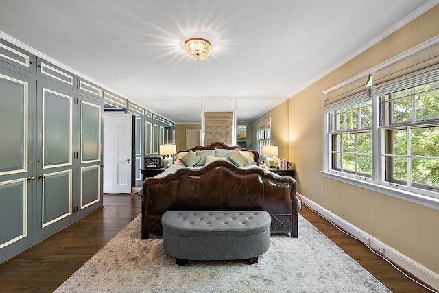 bedroom featuring dark wood-type flooring