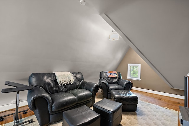 interior space with lofted ceiling and light wood-type flooring