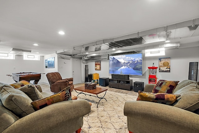 home theater with wood-type flooring and pool table