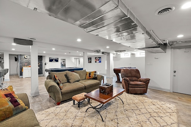 living room featuring billiards and light wood-type flooring