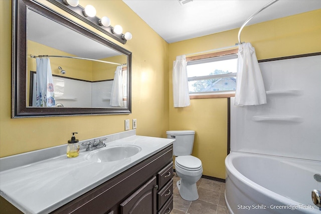 full bathroom with tile patterned flooring, shower / tub combo with curtain, vanity, and toilet