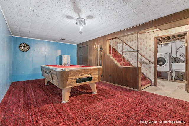 game room featuring sink, washer / clothes dryer, billiards, and wood walls