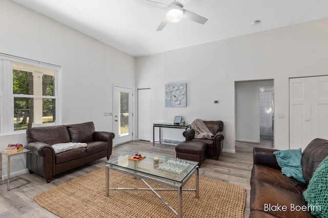 8981 Spruce Ave Unit B, Newaygo, MI 49337 - living area with a ceiling fan, light wood-type flooring, and baseboards
