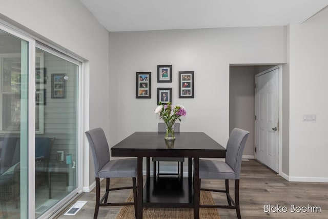 8981 Spruce Ave Unit B, Newaygo, MI 49337 - dining area featuring wood finished floors and baseboards
