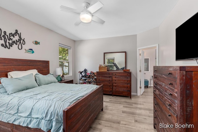 8981 Spruce Ave Unit B, Newaygo, MI 49337 - bedroom with light wood-style flooring and ceiling fan
