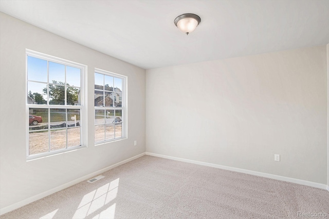 4442 Sprauge Ln, Swartz Creek, MI 48473 - spare room with carpet and baseboards
