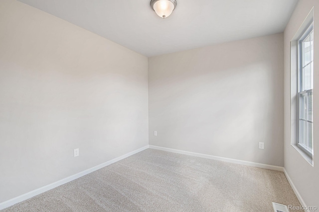 4442 Sprauge Ln, Swartz Creek, MI 48473 - carpeted empty room with baseboards