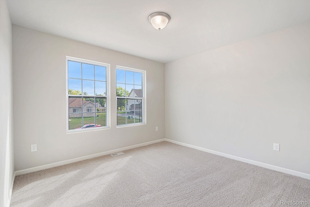 4442 Sprauge Ln, Swartz Creek, MI 48473 - carpeted spare room with baseboards