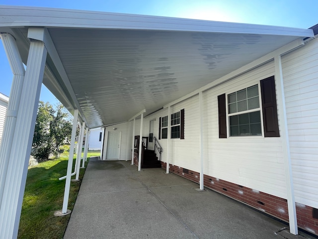 view of patio / terrace with a carport