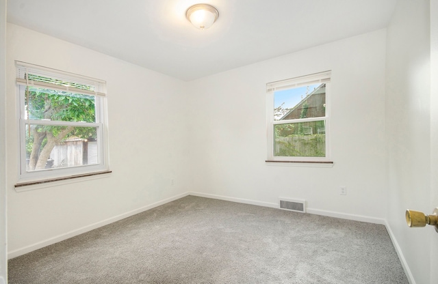 unfurnished room with carpet