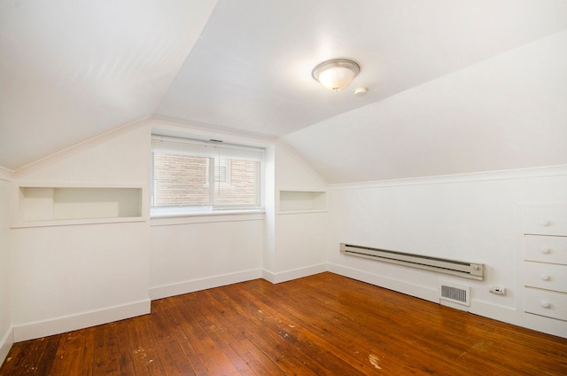 bonus room with a baseboard radiator, lofted ceiling, and wood-type flooring