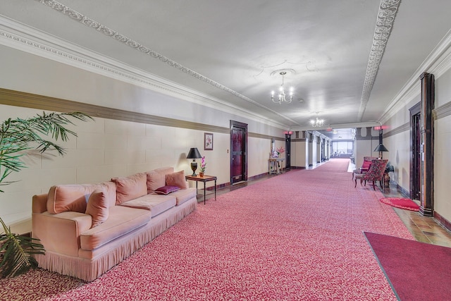 interior space with an inviting chandelier and ornamental molding