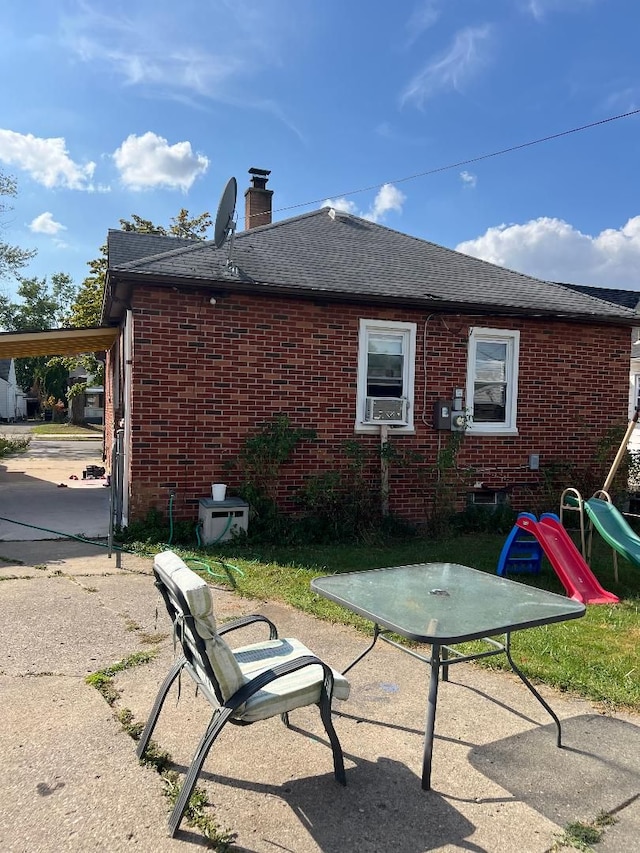 rear view of property with a patio area