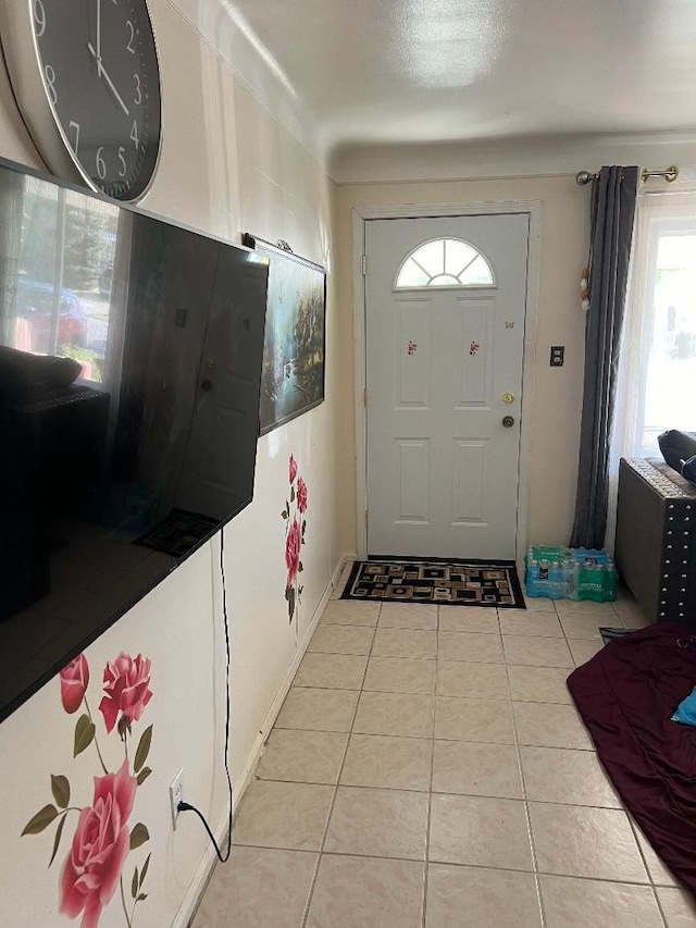 doorway featuring light tile patterned floors