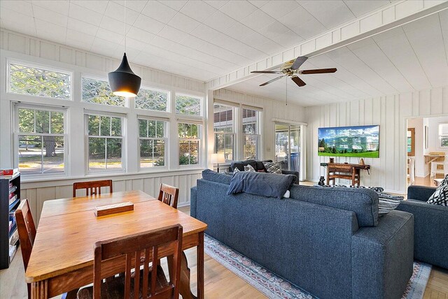 sunroom / solarium with ceiling fan