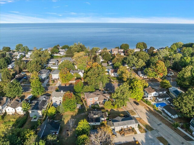 aerial view featuring a water view and a residential view