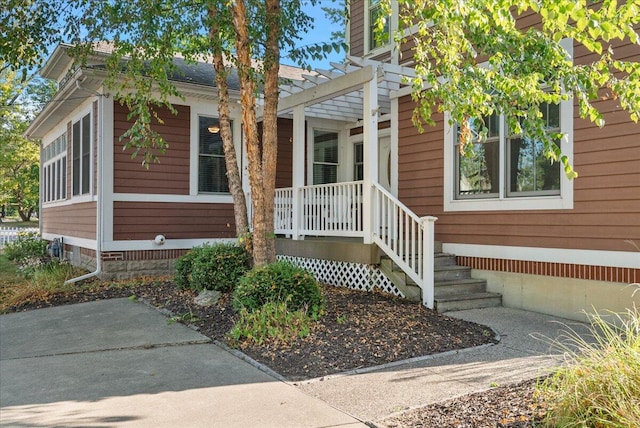 exterior space featuring crawl space and a pergola